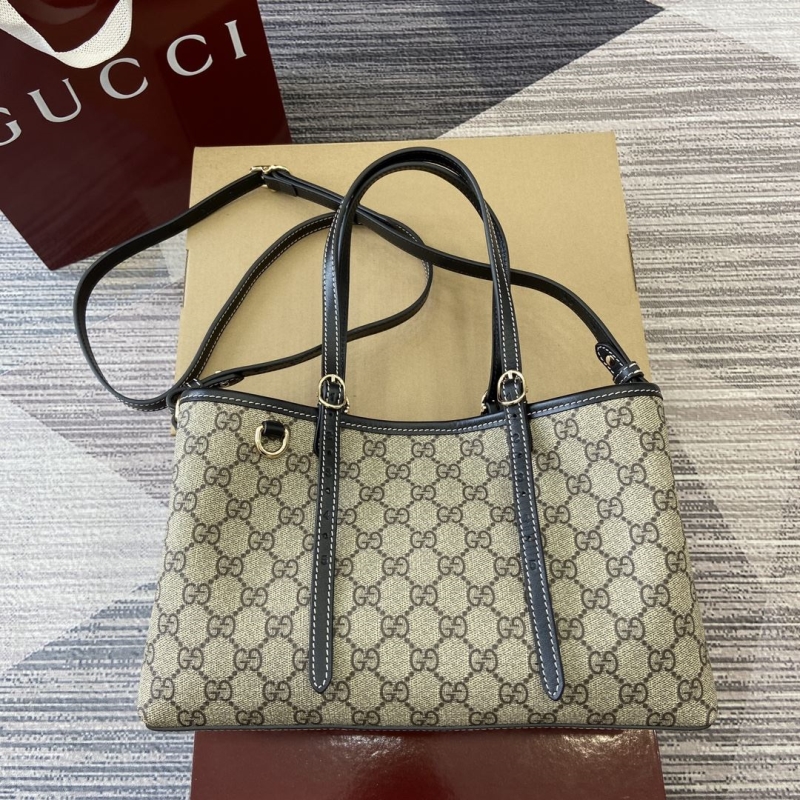 G*u*i shopping bags